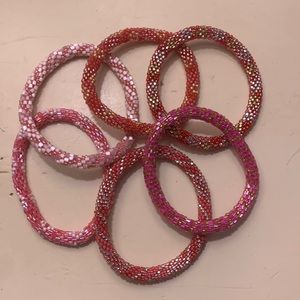Set of 6 pink / red bracelets